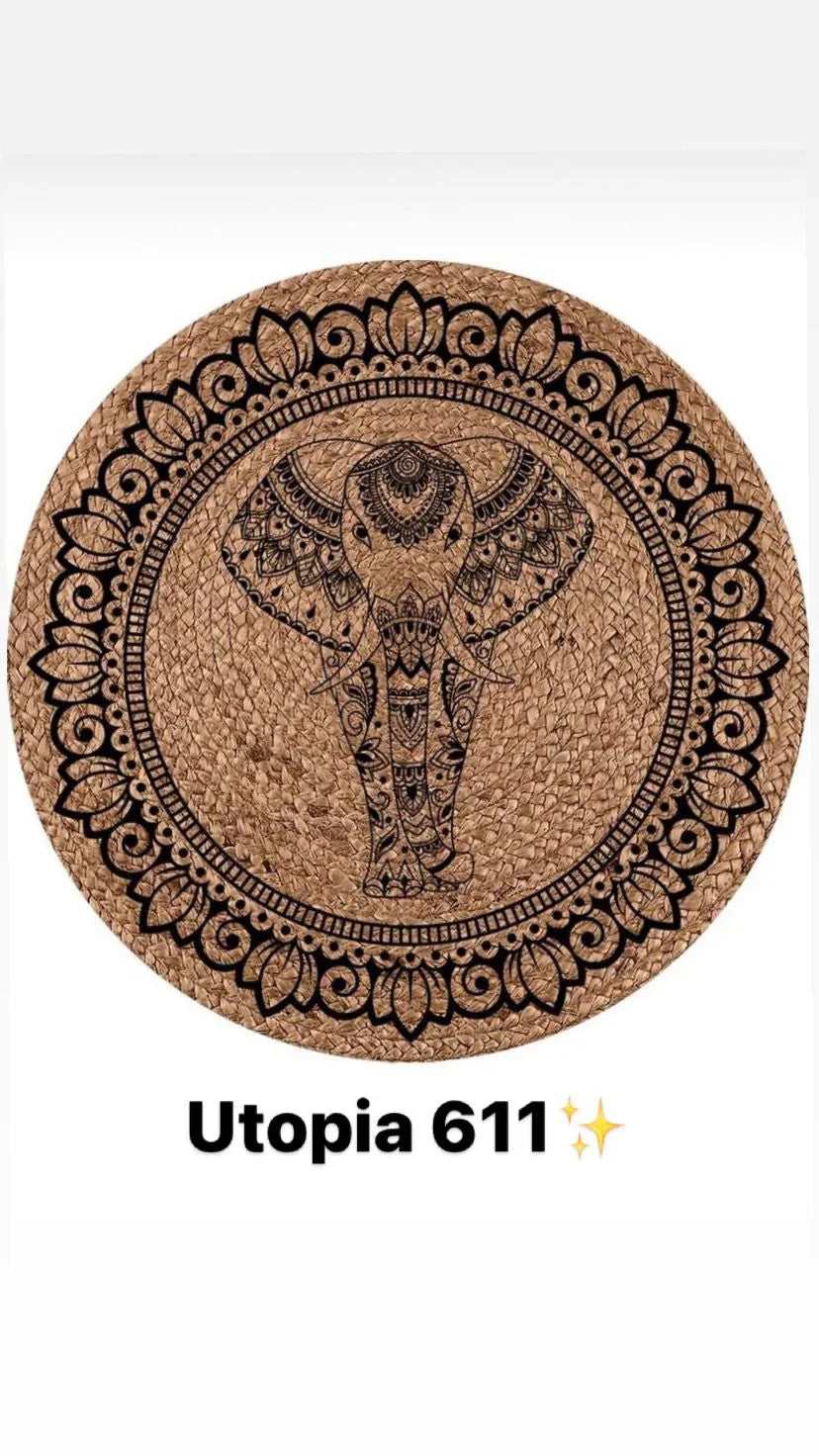 Round jute rug with ornate black elephant and floral mandala design, boho home decor