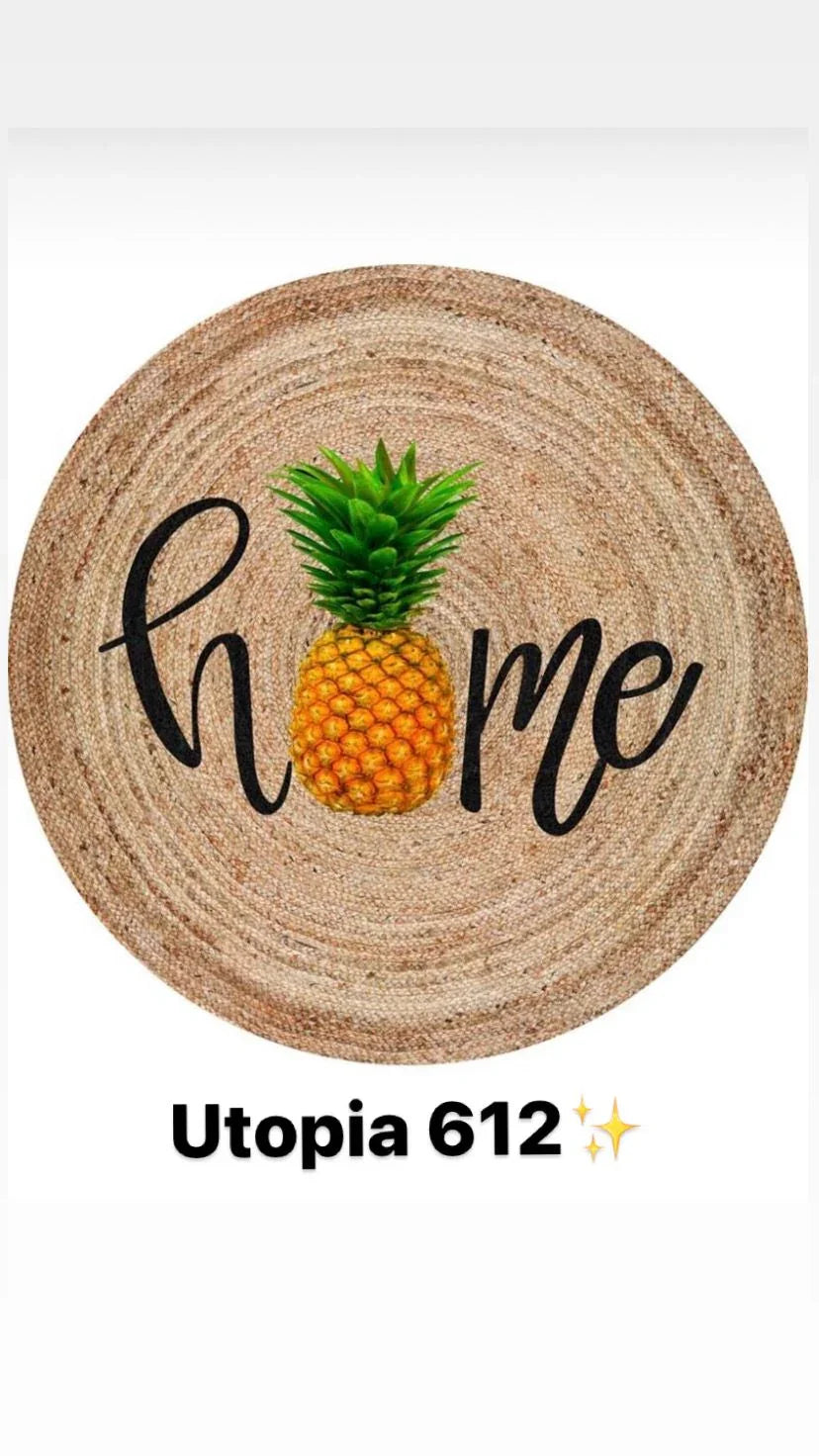 Round natural rug with 'home' text, pineapple design, and woven texture, Utopia 612.
