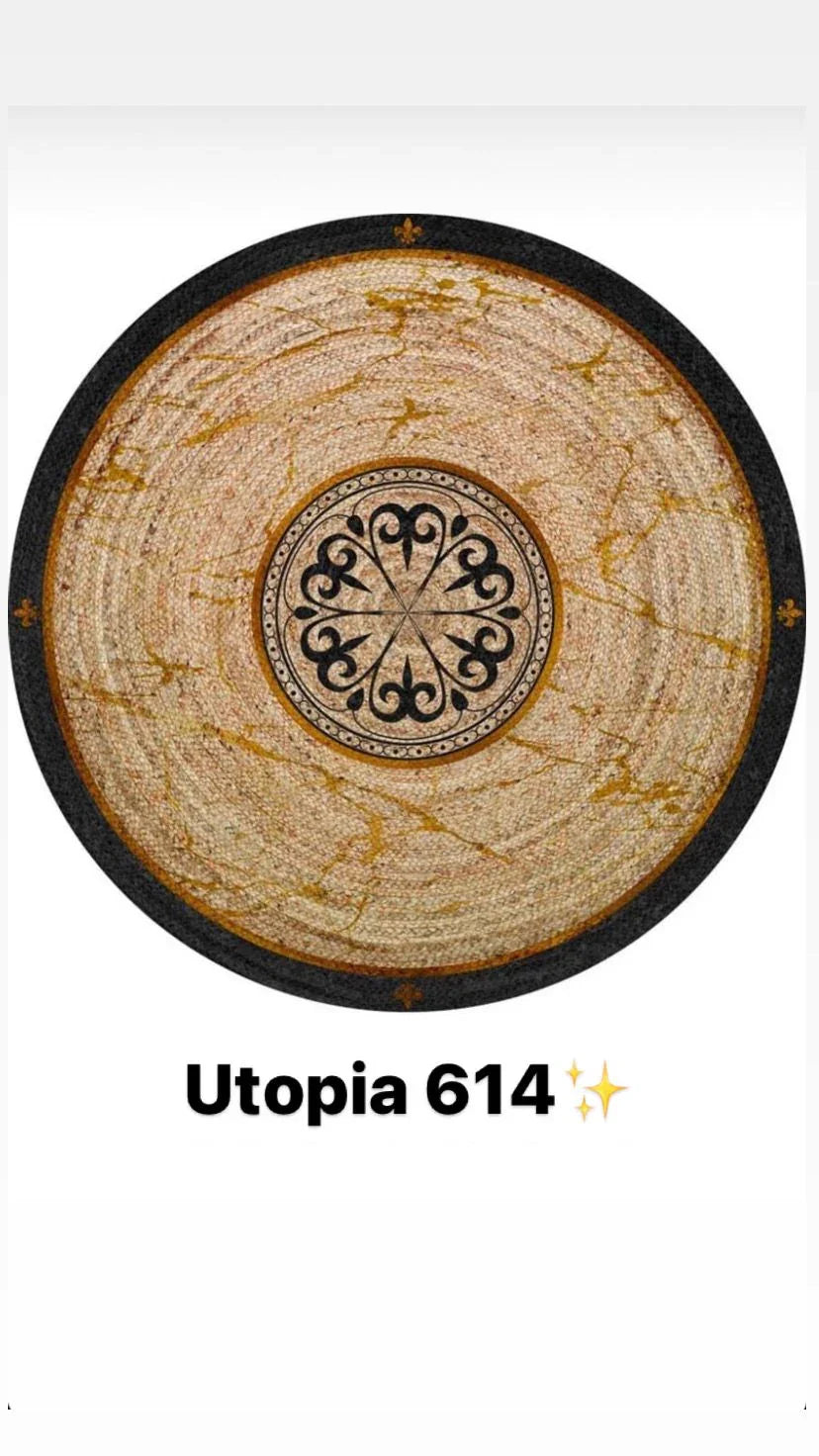 Round bamboo rug with beige and gold marbled pattern, black decorative border, and ornate central design.