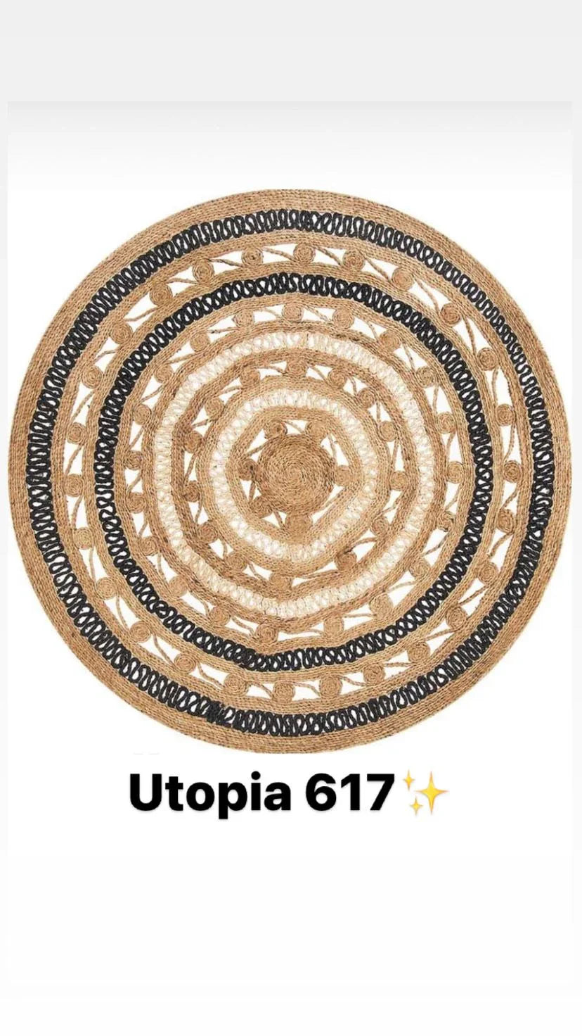 Round natural fiber rug with black and beige patterns, Utopia 617 design.