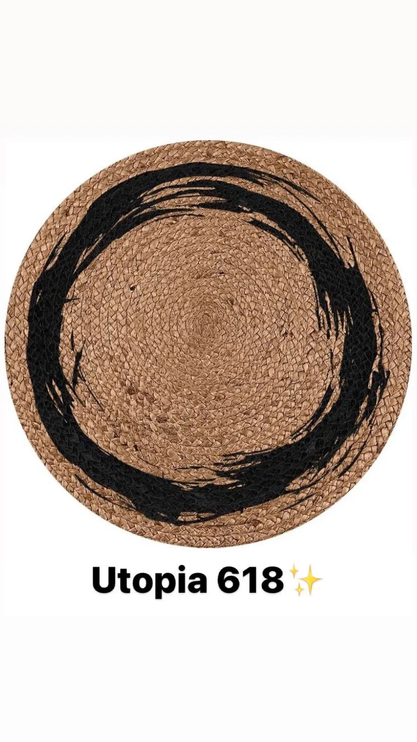 Round woven jute rug with black abstract circle pattern, natural fiber home decor.