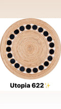 Round natural jute rug with black circular pattern, modern washable carpet design