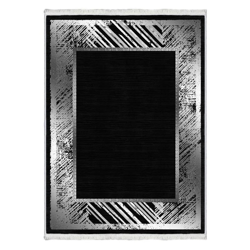 Modern washable area rug with black center and metallic silver geometric border design