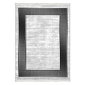 Modern washable rug with light gray center and black geometric border pattern
