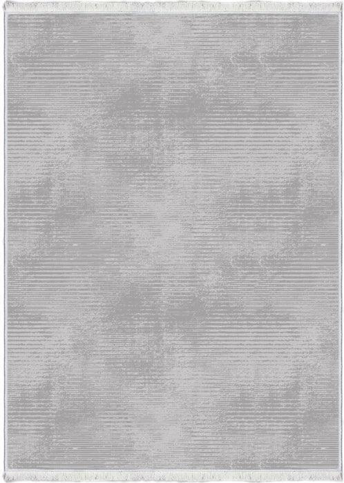 Modern light grey washable rug with subtle textured pattern and short fringe edges