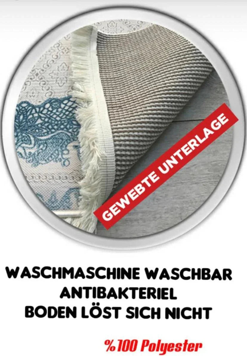 Washable blue patterned rug with woven non-slip underside and fringed edges, 100% polyester